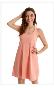 Detail of light orange sleeveless cotton nightgown featuring a racerback and A-line cut