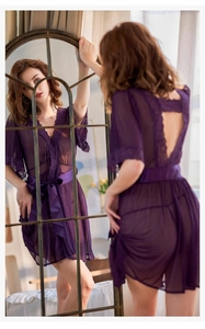 Macro detail of purple sheer lace robe with satin bow tie and intricate back mesh design