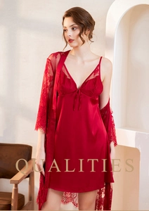 Close-up of red lace robe and satin chemise set with delicate V-neck floral embroidery