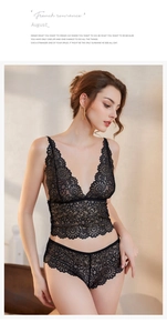 Close-up of elegant floral lace pattern and semi-sheer texture on the black lingerie set