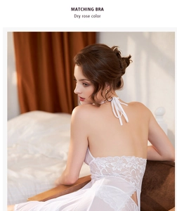 Detail of white floral lace nightgown featuring an elegant halter neck and sheer back design