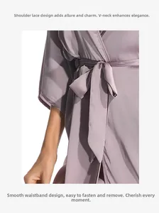 Detail of lavender satin robe featuring delicate lace shoulders and adjustable waist belt