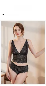 Detailed close-up of sexy black floral lace lingerie set with sheer embroidery texture