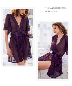 Detail of sheer purple mesh lace robe featuring floral lace trim and satin ribbon belt