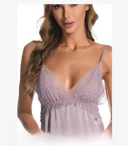 Close-up of deep V-neckline with delicate lace trim and mesh detail on lilac silk sleepwear