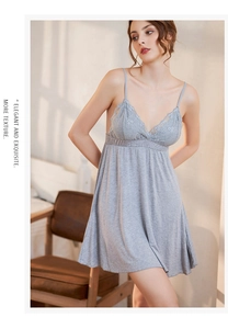 Detailed view of grey modal nightgown with delicate lace trim on the deep V-neckline
