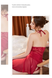Detail of red lace embroidery and sheer mesh fabric on a sexy halter neck nightgown