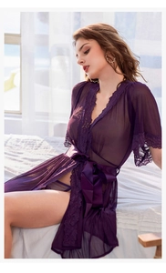Detail showing the intricate floral lace trim on dark purple sheer mesh robe sleeves