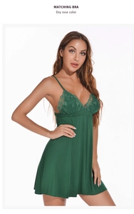 Detail of dark green modal lace nightgown with V-neck and delicate floral embroidery