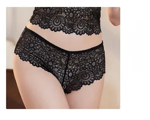 Close-up of black floral lace underwear with intricate embroidery and low-rise design