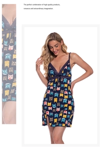 Detail of navy blue modal nightgown with lace V-neckline and cute cartoon cat pattern