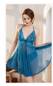 Close-up of peacock blue lace nightdress with deep V neck and delicate floral patterns