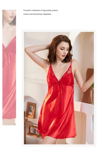 Detailed view of red satin sleepwear with delicate lace trim and ribbon bow detail