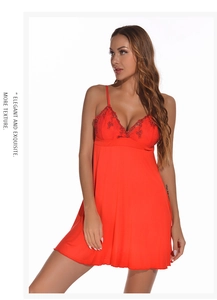 Close-up of red modal nightdress with delicate black floral lace and thin straps