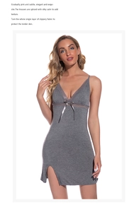 Detail of grey modal nightdress showing delicate lace V-neckline and small bow accent