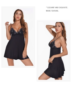 Detail of black modal nightdress featuring grey lace trim and v-neck design