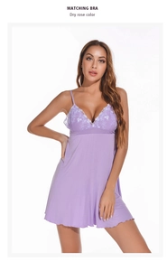 Close-up of lavender modal nightdress featuring delicate white floral lace V-neckline
