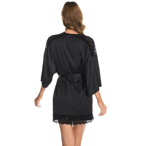 Satin lace sleepwear set with deep V-neck and tie-waist robe in elegant black silk texture
