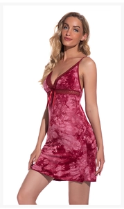 Close-up of wine red tie-dye modal slip dress with delicate lace V-neck and satin bow