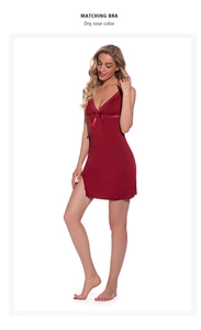 Detail of dry rose modal nightdress with V-neck lace trim and bow accent