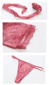 Détail de la dentelle florale rose et du string de l'ensemble de nuit deux pièces