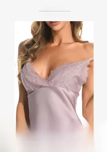 Close-up of lavender satin slip dress with deep V-neck and intricate lace embroidery