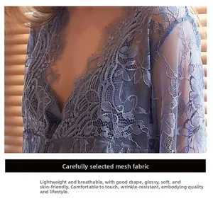 Macro shot of breathable blue lace fabric and sheer floral mesh nightgown detail