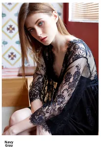 Detail of orchid grey lace robe featuring sheer floral patterns and eyelash lace trim