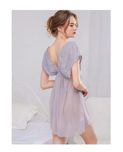 Close-up of lilac lace embroidery and sheer mesh fabric on this elegant nightgown