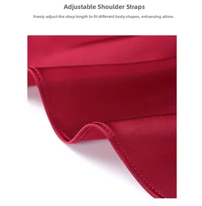 Close-up of red satin fabric showing smooth texture and adjustable straps detail