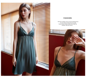 Detailed view of dark green satin sleepwear set with exquisite lace trim and V-neckline