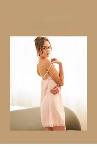 Detailed lace trim on pink satin nightdress with V-neck and thin shoulder straps