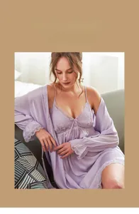 Detail of lavender satin nightdress with delicate floral lace trim and V-neckline