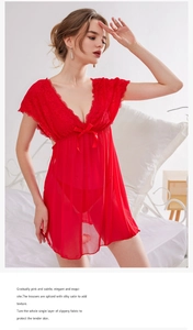 Detail of red lace V-neck bodice and bow ornament on sheer mesh babydoll lingerie