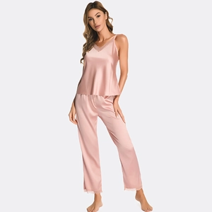 Pink silk satin pajama set for women with V-neck camisole and lace-trim trousers