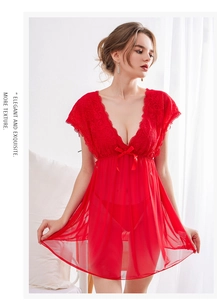 Close-up of red lace lingerie nightgown featuring deep V-neck and delicate silk bow detail