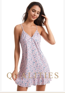 Detail of lavender floral slip dress with V-neckline and ruffled hemline in soft fabric