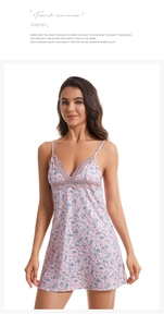 Detail of floral lace trim and V-neckline on a pink knit cotton sleepwear dress