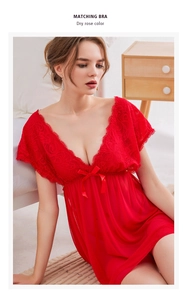 Detail of dry rose lace nightdress with deep V-neck and satin bow decoration