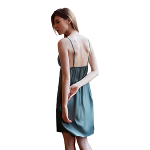 Elegant dark green silk nightgown featuring a backless design and thin spaghetti straps