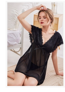 Detailed close-up of sexy black lace V-neck nightgown with mesh fabric and silk bow