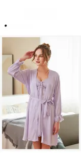 Detail view of lace cuffs on light purple satin robe and matching slip nightgown set