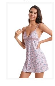 Detail of pink floral nightdress with delicate purple lace trim on the V-neckline