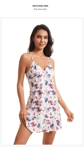Detailed close-up of floral print nightgown featuring ruffled hem and dry rose patterns