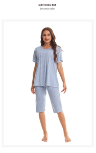 Detail of light blue short sleeve pajama set with dry rose dot pattern and elastic waist