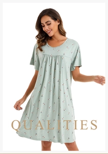 Detail of light green floral nightdress featuring pleated chest design and soft cotton fabric