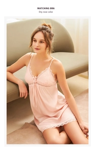 Detailed lace trim and smooth satin finish on a dry rose V-neck slip nightdress