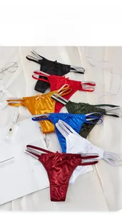 Satin thongs in multiple colors with glittery side straps and bow details