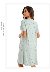 Detail view of light green floral nightdress with soft cotton fabric and elegant print