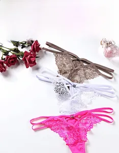 Three-color floral lace thongs in brown, white, and pink with delicate side straps